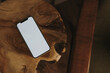 © Floral Deco - Flatlay phone on wooden textured surface. Aesthetic elegant blog, social media, web template