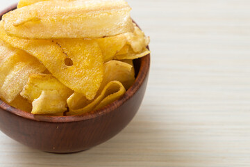 Wall Mural - Banana Chips - fried or baked sliced banana