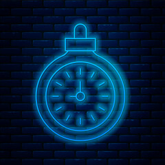 Poster - Glowing neon line Pocket watch icon isolated on brick wall background. Vector