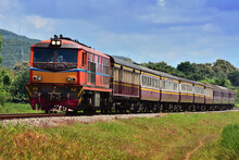 Thai Passenger Train By Diesel Locomotive On The Railway.