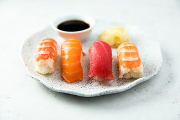 Wall Mural - Assorted sushi with ginger and soy sauce