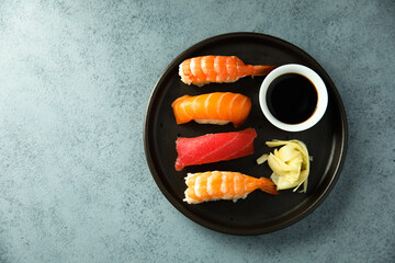 Wall Mural - Assorted sushi with ginger and soy sauce