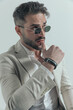 © Viorel Sima - sexy businessman with glasses sensually touching lips and looking to side