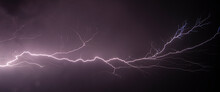 Powerful Lightning Strikes Over The Night Sky