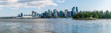 A View From The Bay Towards Stanley Park And Canada Place In Vancouver, Canada In Summertime