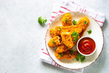 Chicken Nuggets With Ketchup Sauce At White Table. Top View Image With Copy Space,