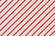 Candy cane striped pattern. Seamless Christmas background. Peppermint wrapping print with diagonal lines. Cute caramel package texture. Xmas holiday geometric backdrop. Vector illustration.