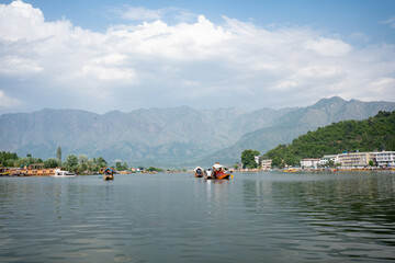 A view of Dal Lake in winter, and the beautiful mountain range in the background in the city of Srinagar, Kashmir, India.