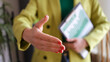 © megaflopp - Businesswoman stretching hands for handshaking, greeting gesture