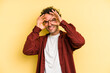 © Asier - Young caucasian man isolated on yellow background excited keeping ok gesture on eye.