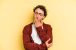 © Asier - Young caucasian man isolated on yellow background yawning showing a tired gesture covering mouth with hand.