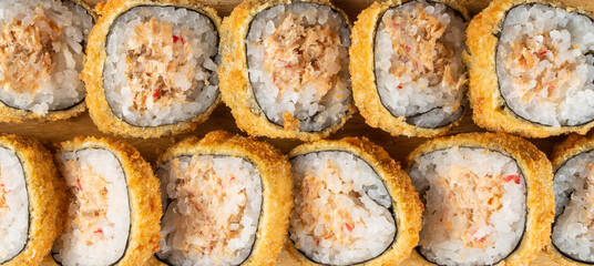 Wall Mural - Typical japanese hot rolls with nori, rice and salmon