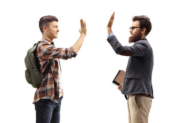 Canvas Print - Student gesturing high-five with a teacher