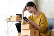 © PaeGAG - Starting small businesses SME owners female entrepreneurs check online orders to prepare to pack the boxes, sell to customers, sme business ideas online.