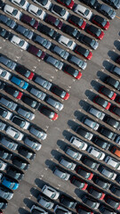 Wall Mural - Aerial top view rows of new cars parked in distribution center on car factory, Automobile and automotive car parking lot for commercial business industry to dealership for sale.