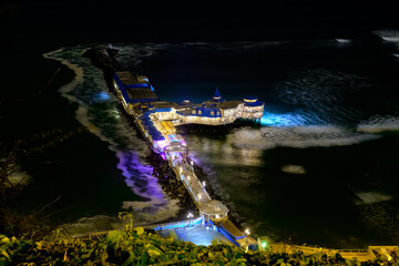 Wall Mural - Pier in the ocean at night. Lima, peru.