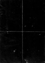 Poster - Folded paper with grungy texture in black background. can be used to replicate the aged and worn look for your creative design. old paper for photo texture overlay in retro style