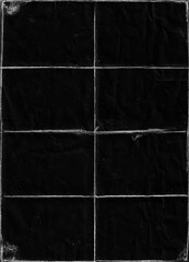 Poster - Folded paper with grungy texture in black background. can be used to replicate the aged and worn look for your creative design. old paper for photo texture overlay in retro style