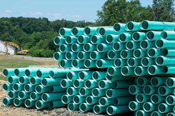 Wall Mural - piles of concrete pipes for transporting water and sewerage