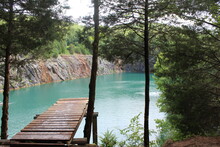 Wooden Bridge Over The Blue Lake 