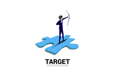Poster - Businessman in suit shoot the arrow on jigsaw . Concept of start business and ready to shoot.