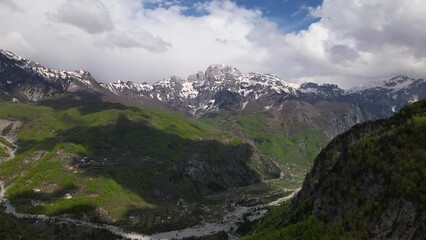 Wall Mural - Valley of Theth in Albania with green forests and high peaks of alpine mountains