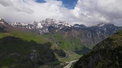 Wall Mural - Paradise alpine landscape with valley between green forests and mountains