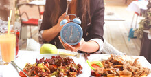 Selective Focus Of Blue Clock For Intermittent Fasting Icon, IF, Fat Burn, Growth Hormone-diet Concept