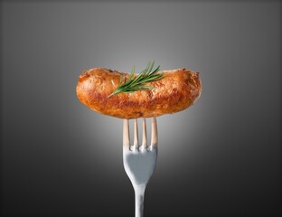 Sticker - Tasty Grilled sausages with rosemary on a fork.