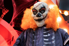 Portrait Of Bad Bloody Clown With Orange Hair. Horror Clown. Blood Freak.