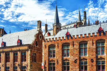 Canvas Print - Several historical red houses in Bruges, Belgium