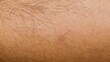 close-up black human body hair on tan human background texture