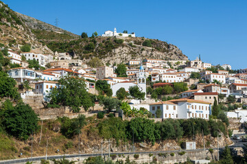 Wall Mural - Coastal village of Dhermi with white houses on the slope of mountains. Albania