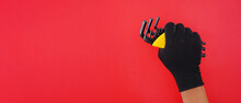 Hand Wearing White Gloves Holding Hexagon Or Allen Wrenches Or Hex Key On A Red Background, Isolate, With Clipping Path. 