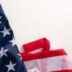 Wall Mural - Concept of Independence day or Memorial day. Flag over bright marble table background.