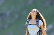 © Antonioguillem - Backpacker in the mountain breathing fresh air