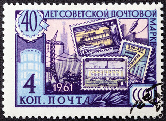 Wall Mural - RUSSIA - CIRCA 1961: Stamp printed in USSR Russia shows Old Soviet postage stamps, Soviet achievements, series The 40th Anniversary of First Soviet Stamp, circa 1961