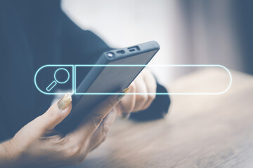 Wall Mural - The concept of using technology to search engine optimizationfor information business woman using laptop to find online shopping information and other information for use in marketing
