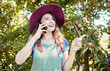 © Jade M/peopleimages.com - Cheerful farmer speaking on phone while planning tasks for harvest season of fresh organic fruit. One happy woman talking on cellphone while working on sustainable apple orchard farm on sunny day.