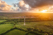 © AmazingAerialAgency - Aerial view of Bodmin Beacon during a dramatic sunset over the beautiful countryside of inland, Lanhydrock, Bodmin, Cornwall, United Kingdom.