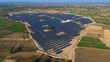 © AmazingAerialAgency - Aerial view of Solar Panel field in Bhojawala, Nagina, Uttar Pradesh, India.