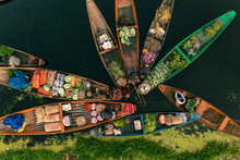 Aerial View Of People On Typical Boats Along The River During The Floating Market, Rainawari, Srinagar, Jammu And Kashmir, India.