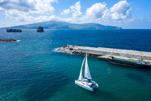 Aerial View Of Sailboat While Sailing In A Regatta Off The Coast Of Matriz, Azores, Portugal.