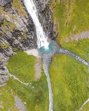 Aerial View Of A Waterfall In Anderson Bay, Unalaska, Alaska, United States.