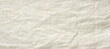 © aninna - wrinkled natural linen fabric, top view, textile background