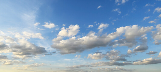 Poster - White clouds against blue sky background