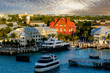 The seaport village of Key West with boats docked in the harbor.   