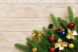 Fototapeta Nowy Jork - Christmas background with fir branches and Christmas decor. Top view, copy space for text