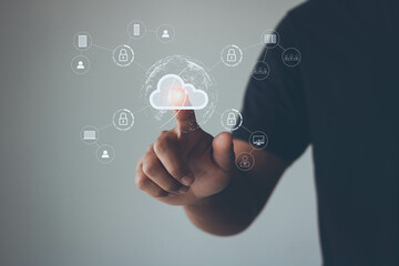 Person working on his smartphone in the home office selects icon cloud on the virtual display. cloud computing technology, internet security, data protection, blockchain, and cyber security concept.