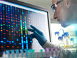 © Connect Images - Scientist viewing DNA sample results on screen during clinical experiment